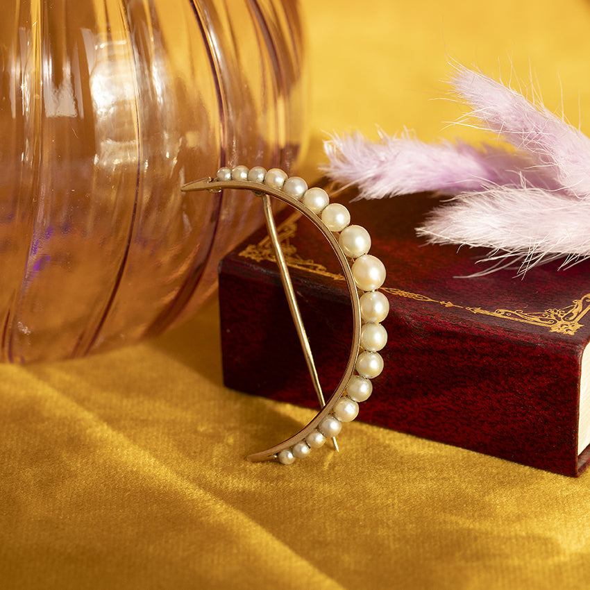 Gouden broche met parel 18 kt