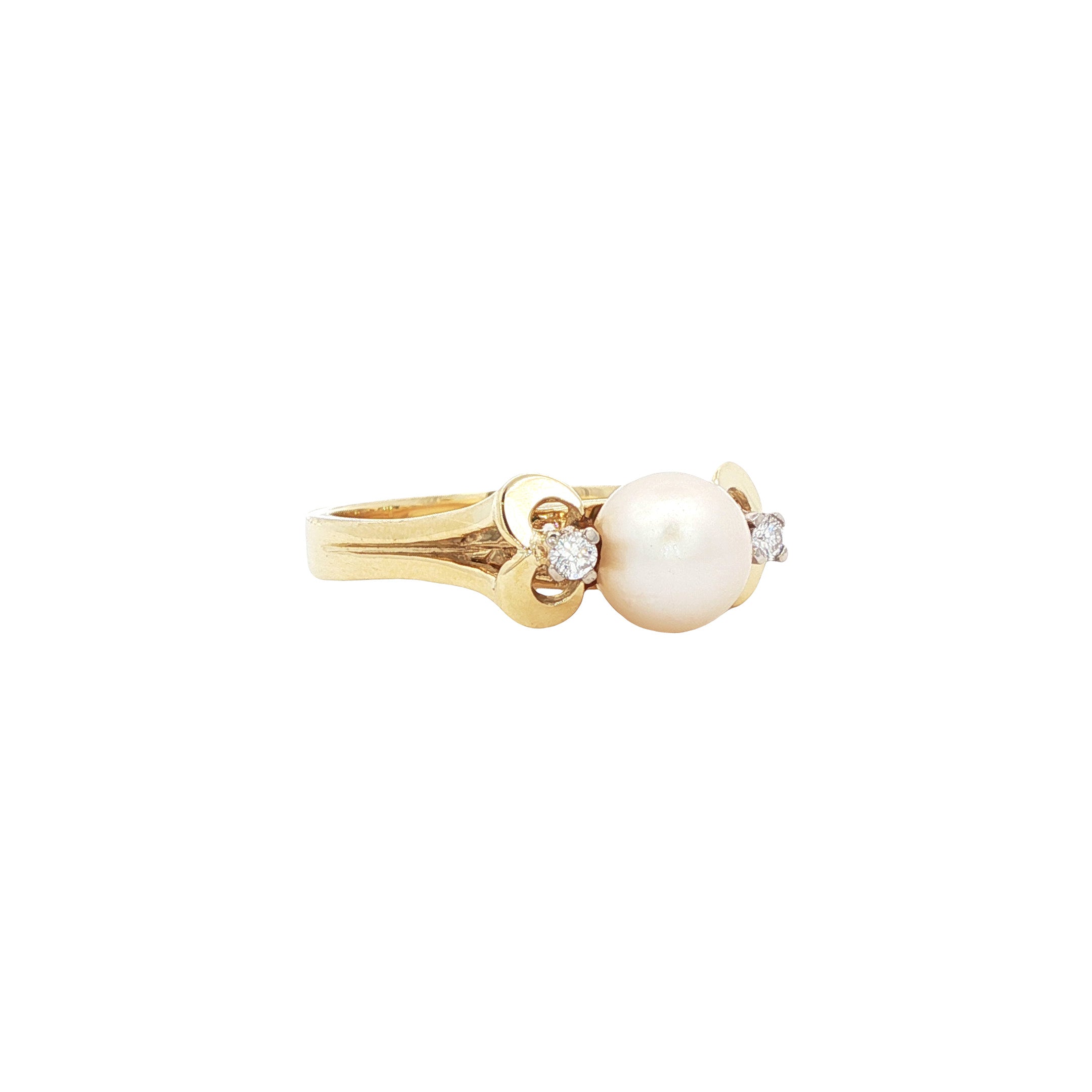 Gouden vintage ring met parel en diamant 14 kt