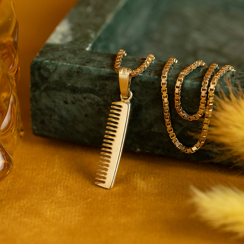14 kt gold comb pendant