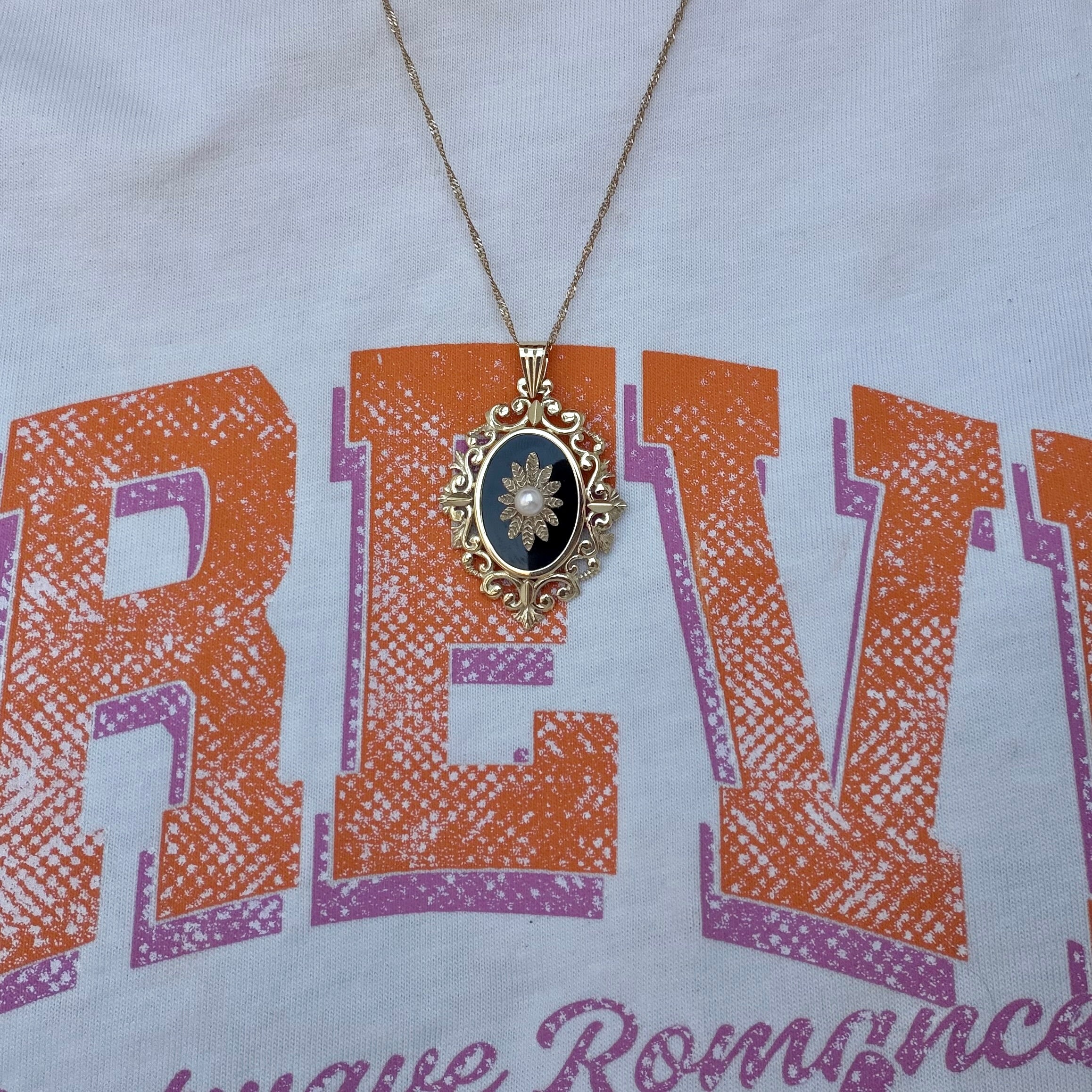 Gouden vintage hanger met onyx en parel 14 kt