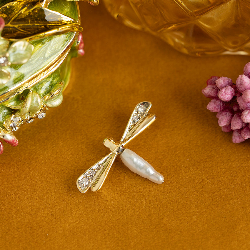 Gouden vintage libelle broche met parel en zirkonia 14 kt