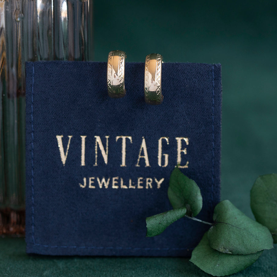 Vintage 14 kt gold mini hoop earrings