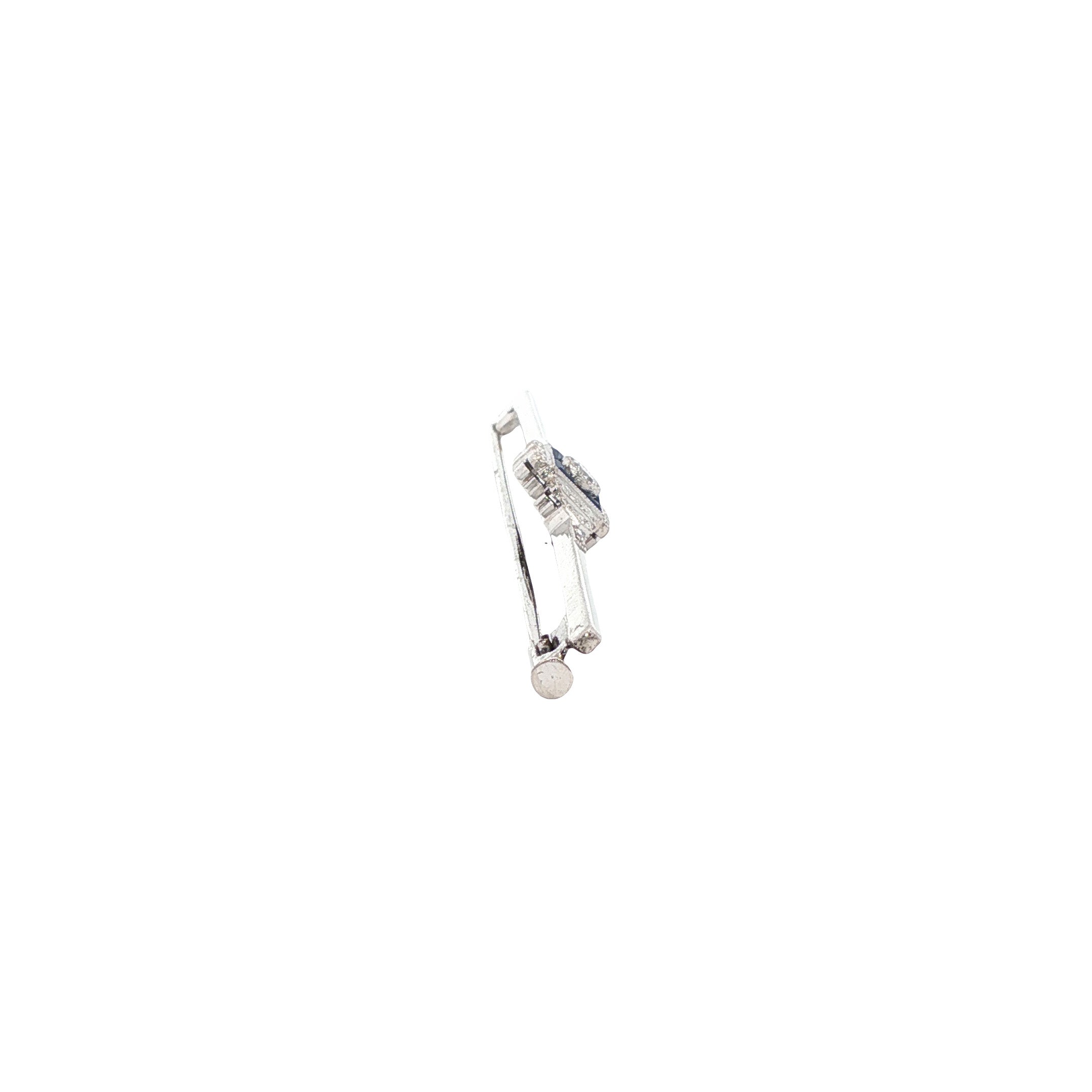 White gold brooch with sapphire and diamond 18 kt/850