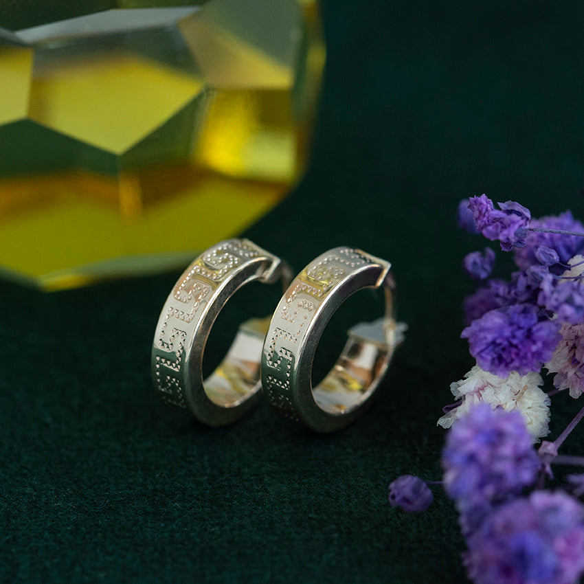 14 kt gold meander earrings