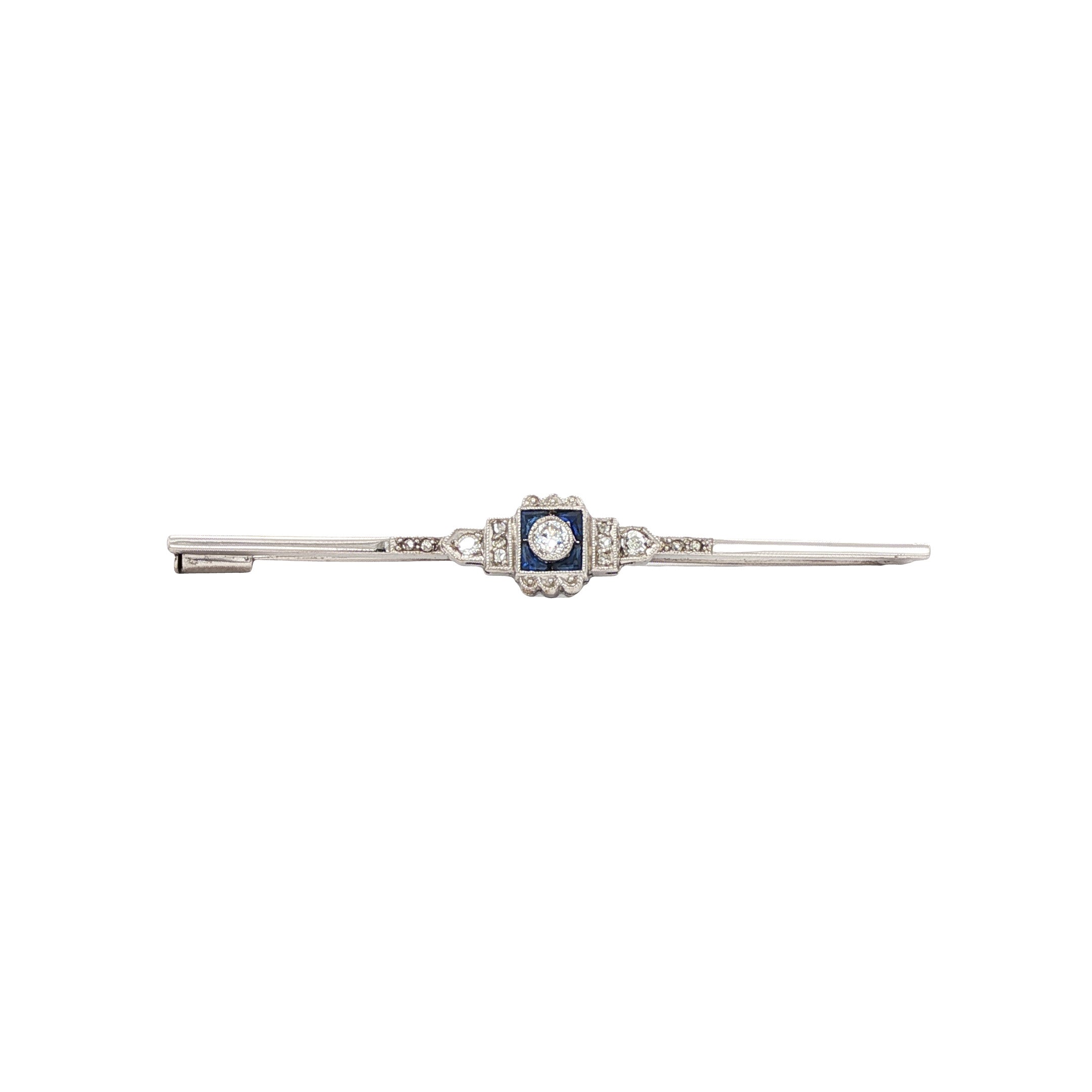 White gold brooch with sapphire and diamond 18 kt/850