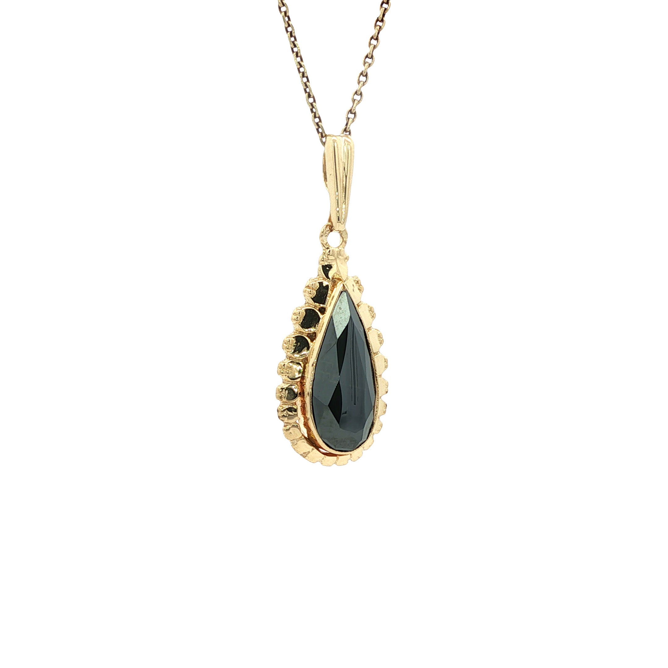 14 kt gold pendant with hematite