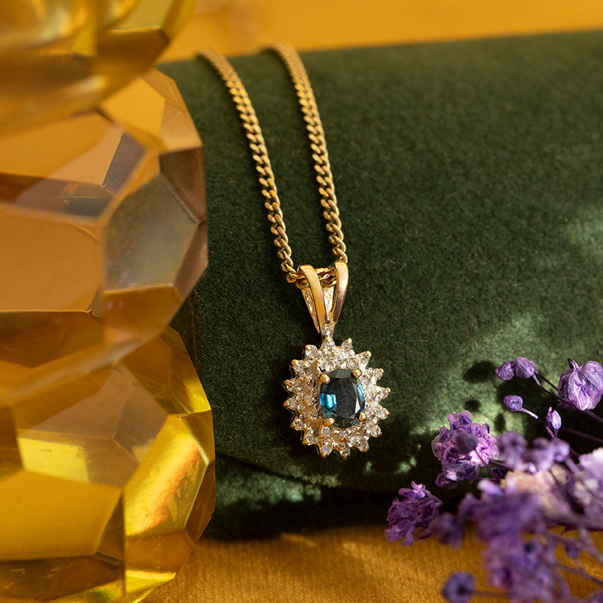 14 kt gold pendant with sapphire and diamond