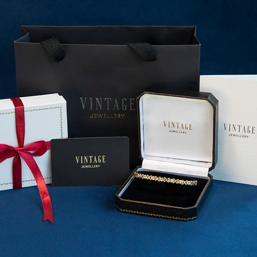 Bicolour gold fantasy bracelet 14 kt