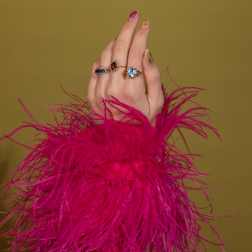 Gouden ring met blauwe topaas 14 kt