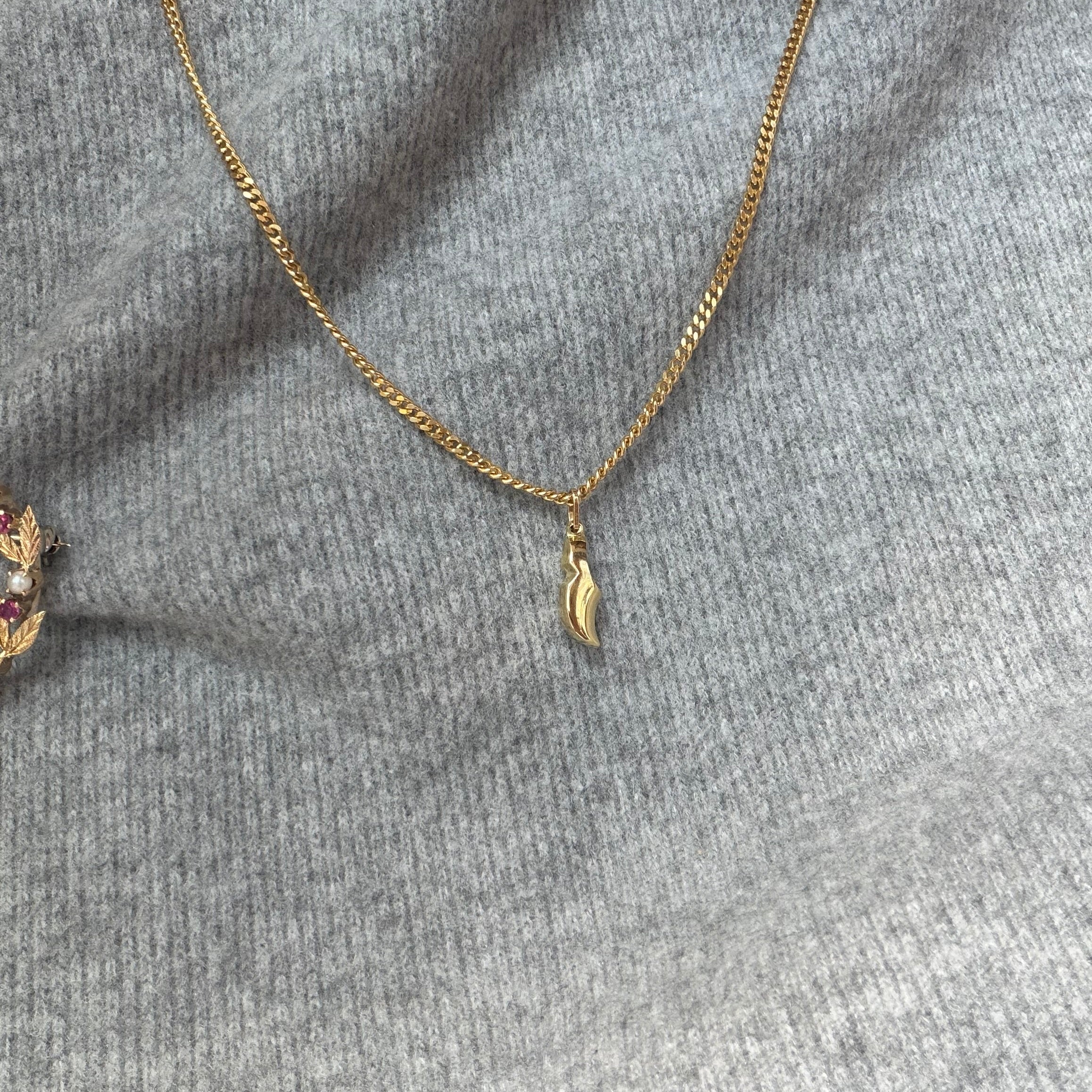 Gouden vintage klomp hanger 14 kt