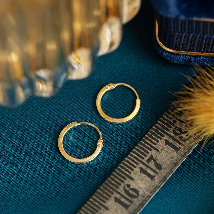 Gouden vintage mini oorringen 14 kt