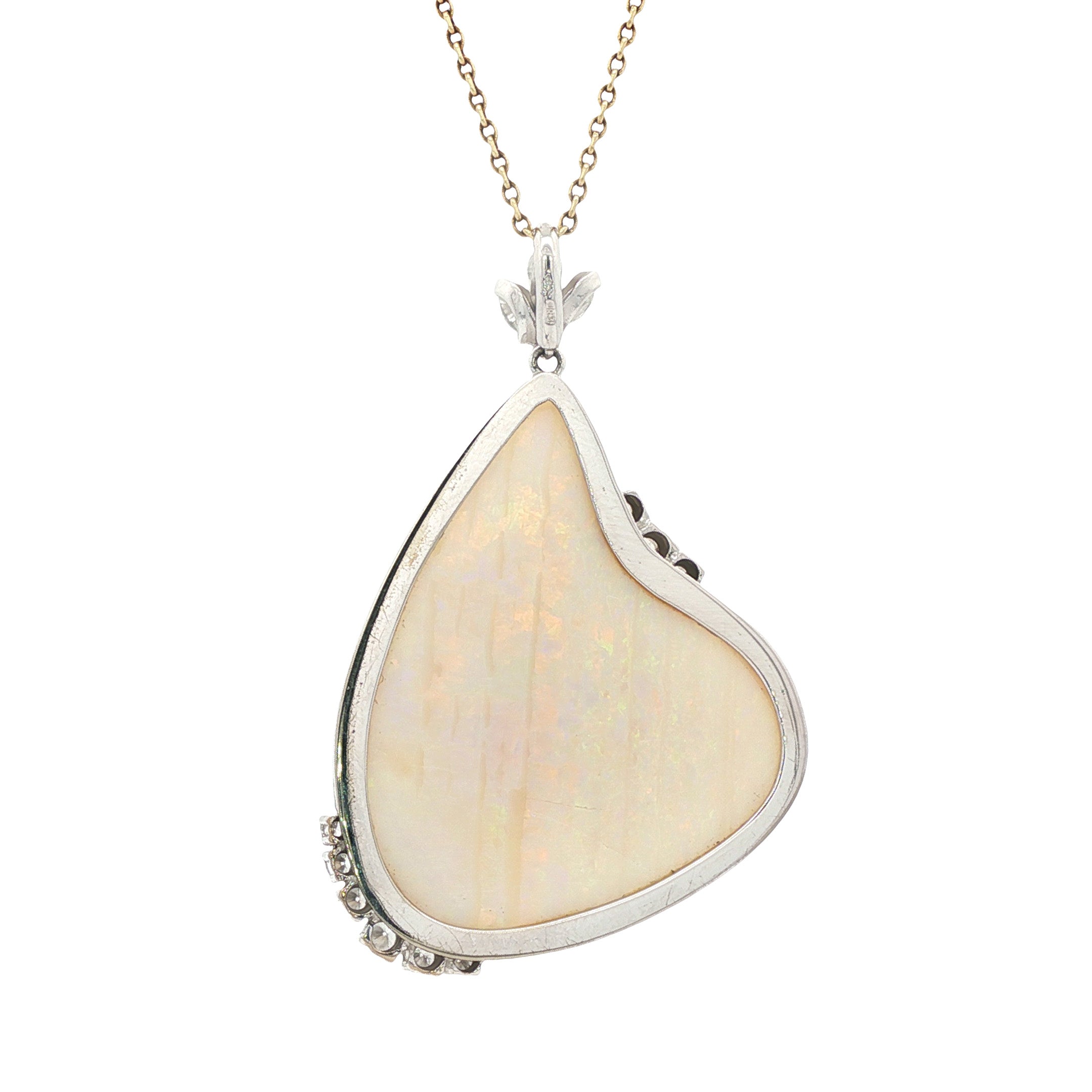 Vintage white gold pendant with opal and diamond, 14 kt