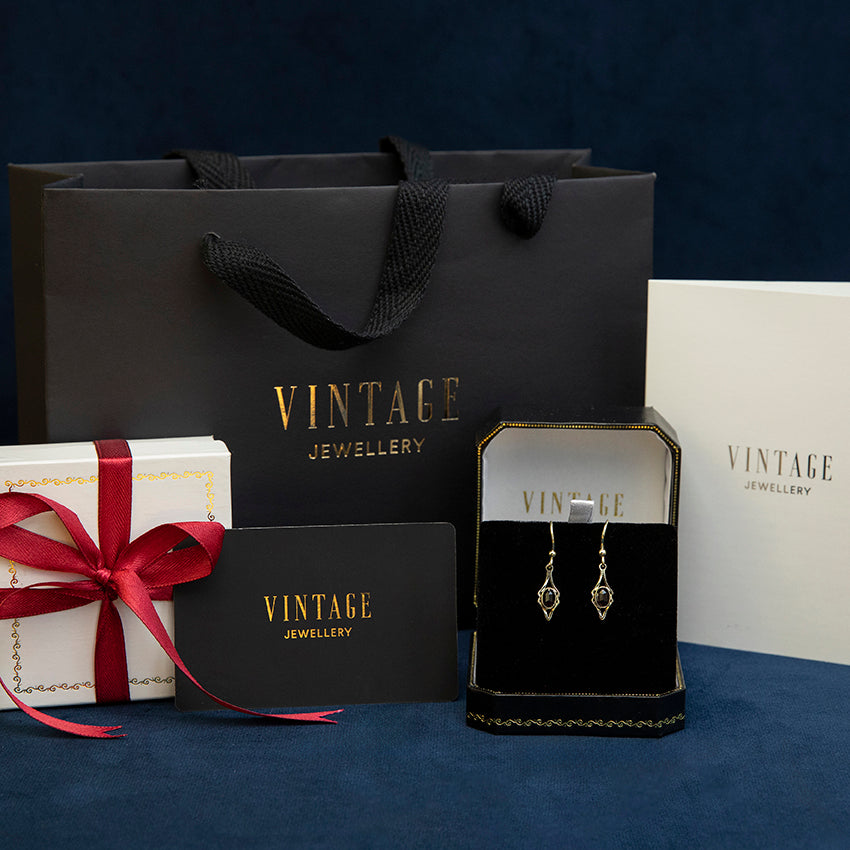 Gouden vintage oorhangers met lapis lazuli 14 kt
