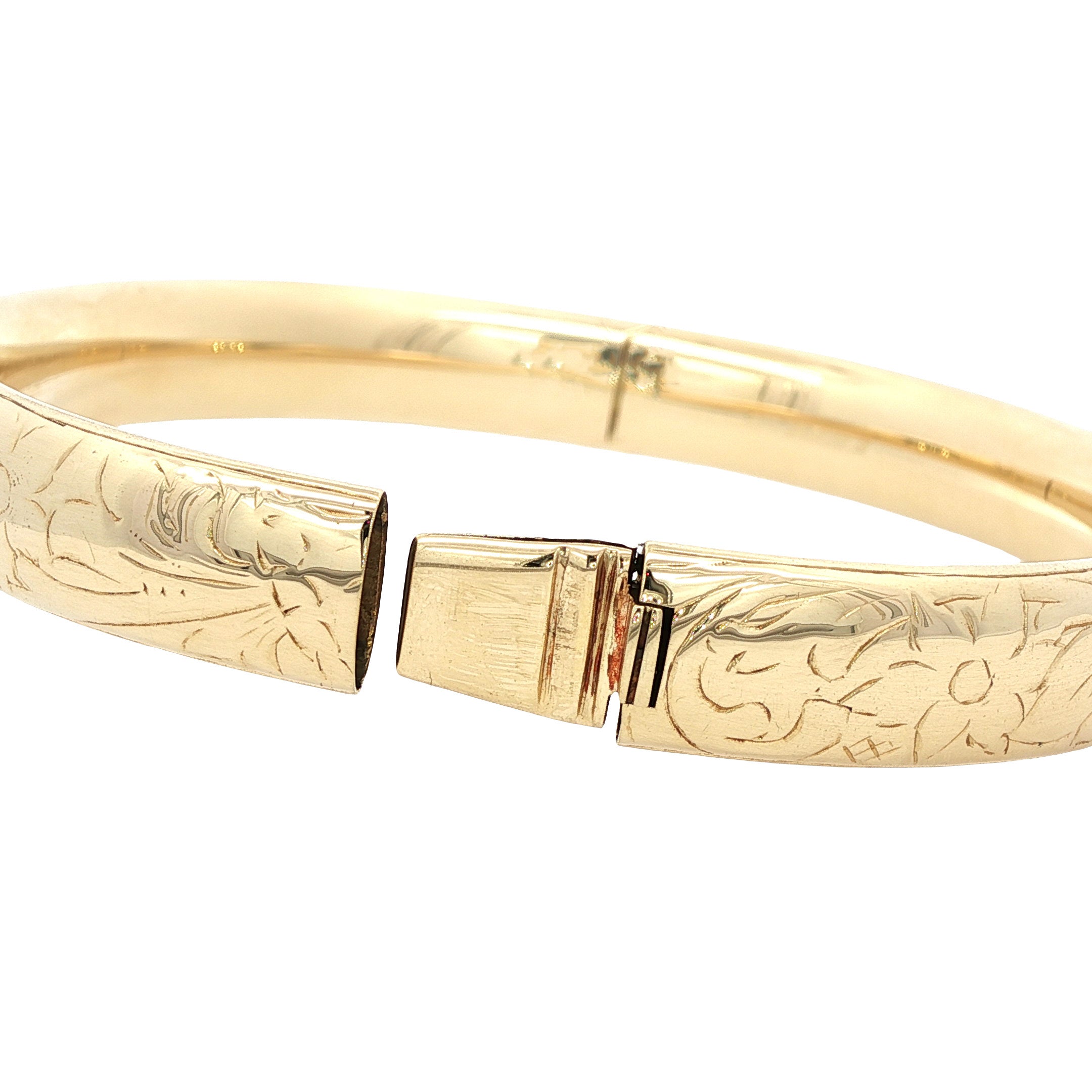 Gold bangle with engraving 14 kt