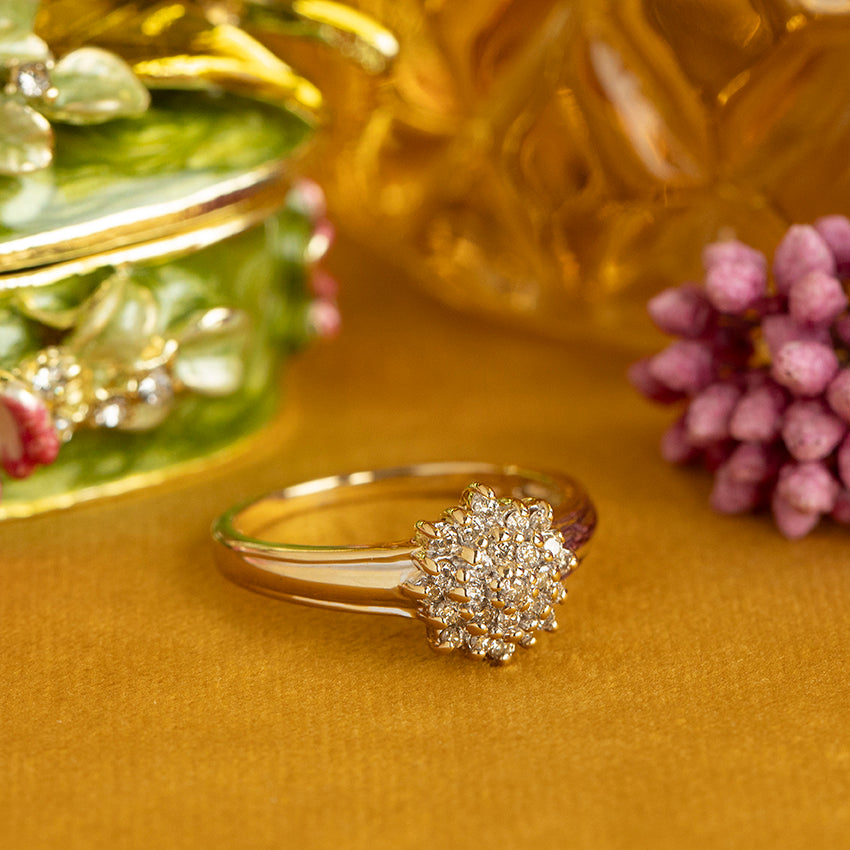 Vintage 14 kt gold halo ring with diamond