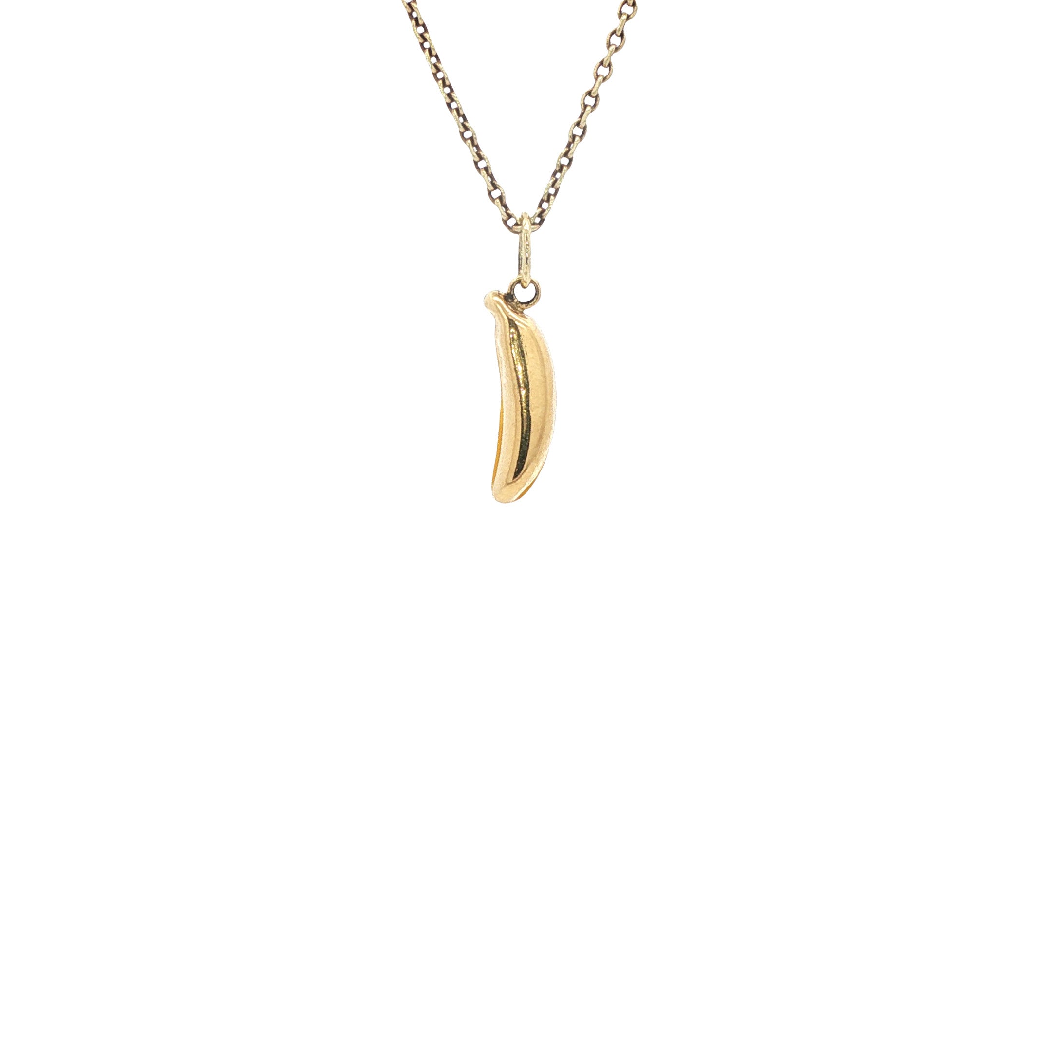 Gold banana pendant with enamel 14 kt
