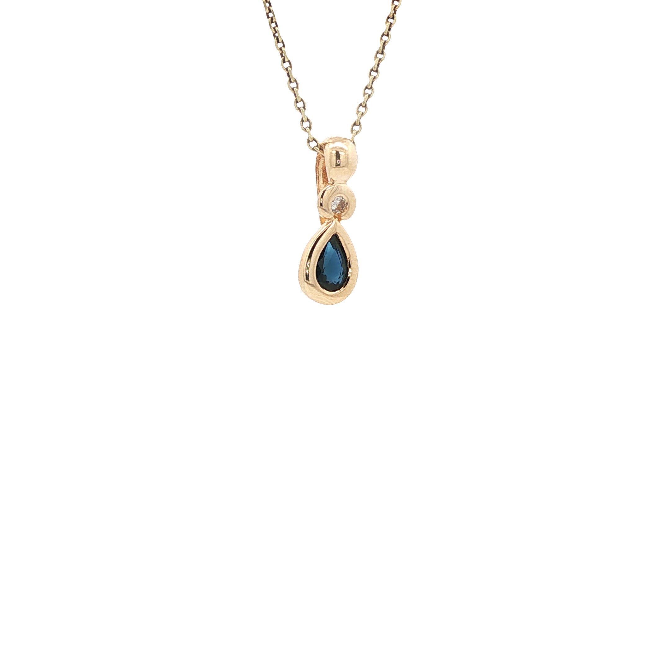 Vintage 14 kt gold pendant with sapphire and diamond.