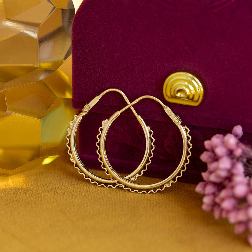 14 kt gold fantasy hoop earrings