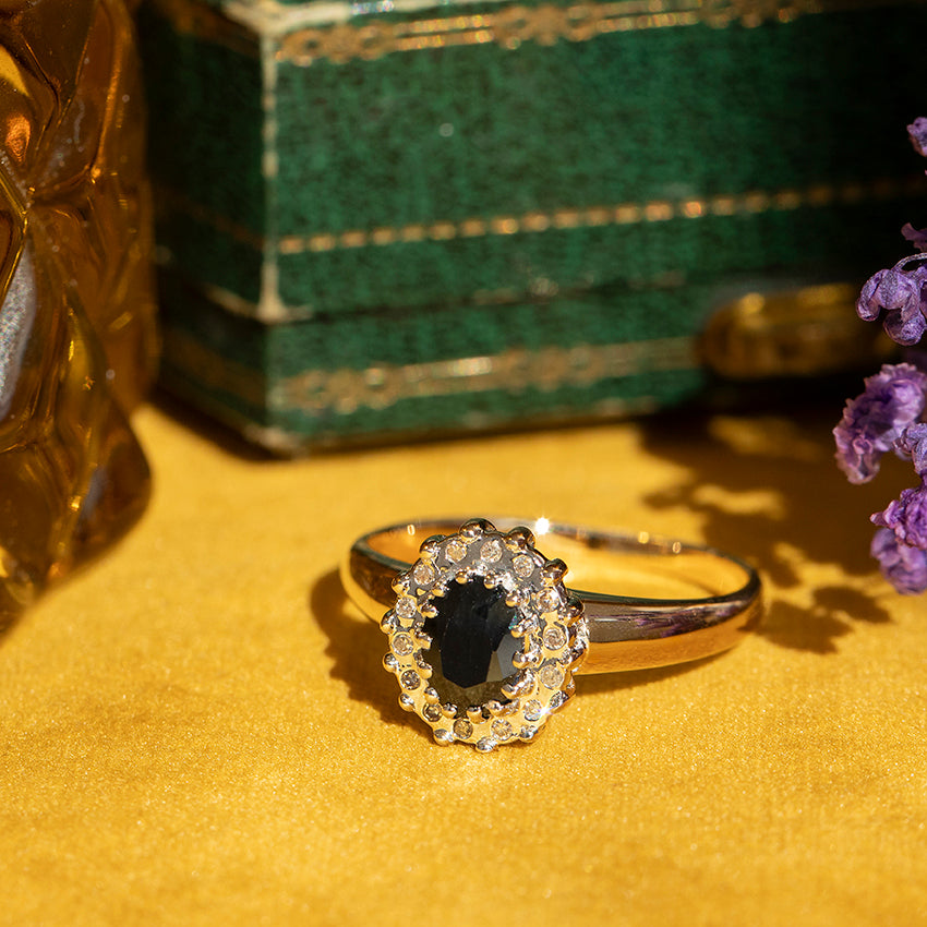 Gouden vintage ring met saffier en diamant 14 kt