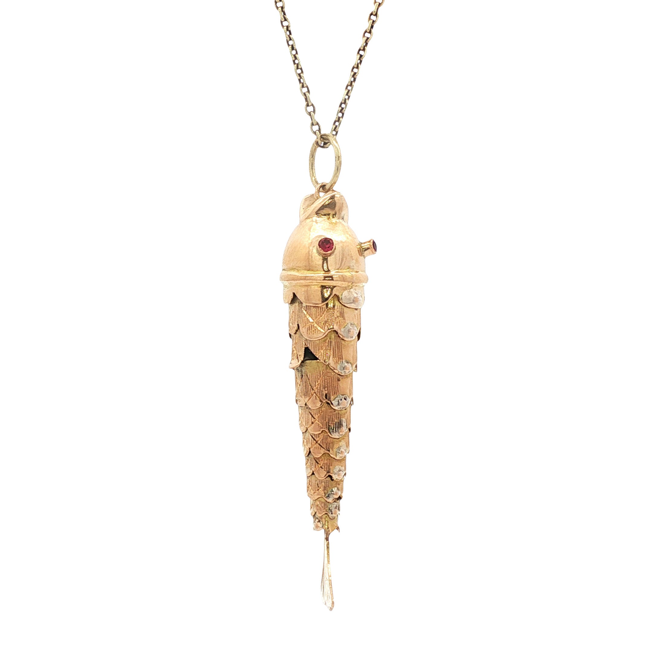 Gold fish pendant with ruby 14 kt