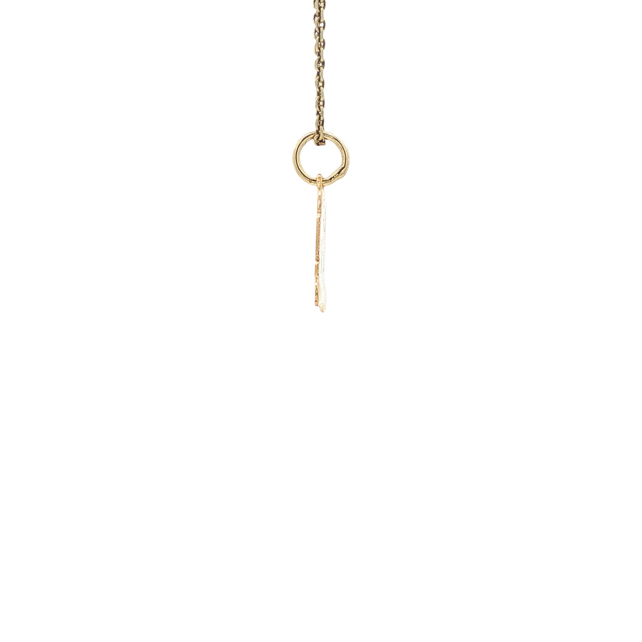 14 kt gold vintage parchment-scroll pendant with Sagittarius