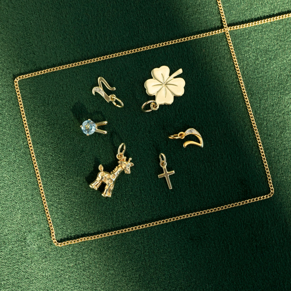 14 kt gold four-leaf clover pendant