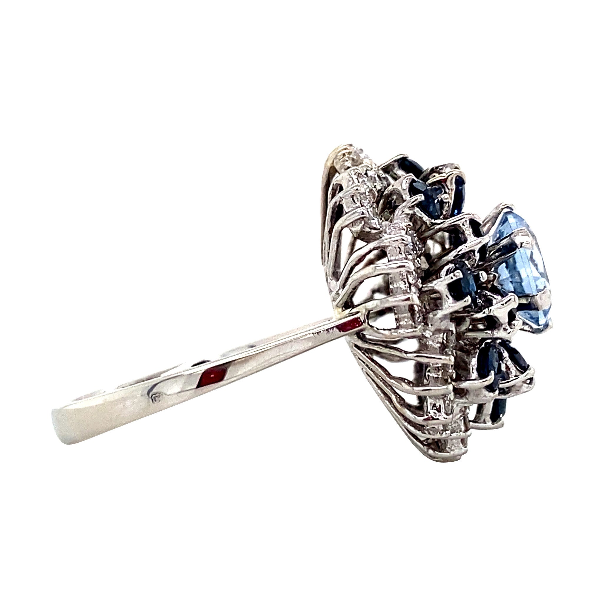 Witgouden entourage ring met spinel, saffier en diamant 18 krt