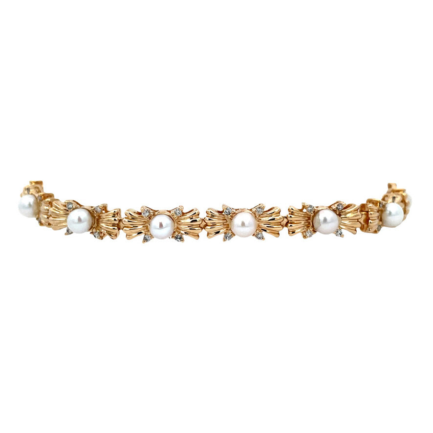 Gouden vintage armband met parel en diamant 14 kt