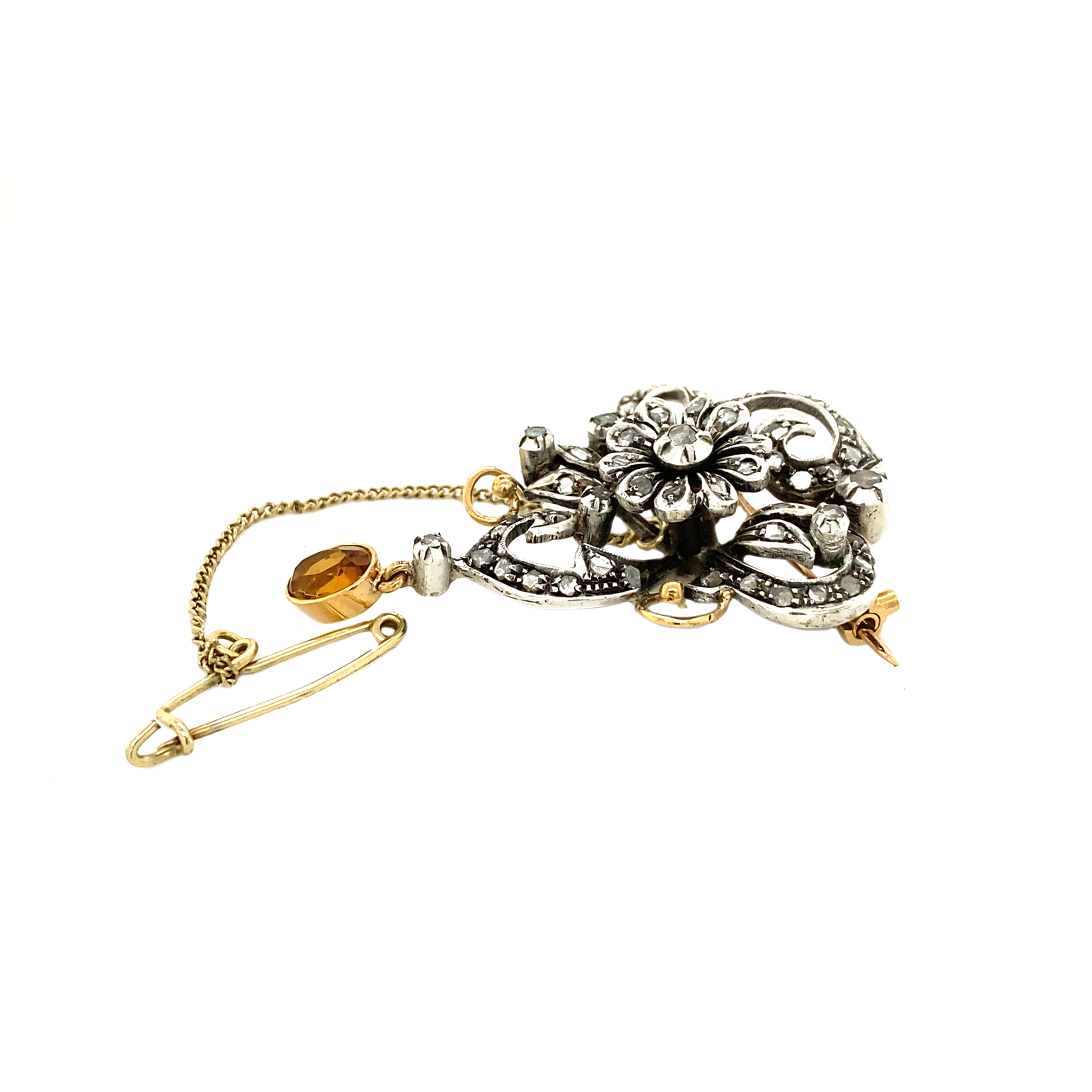 Gold brooch with rose-cut diamond set in silver, 14 kt/925