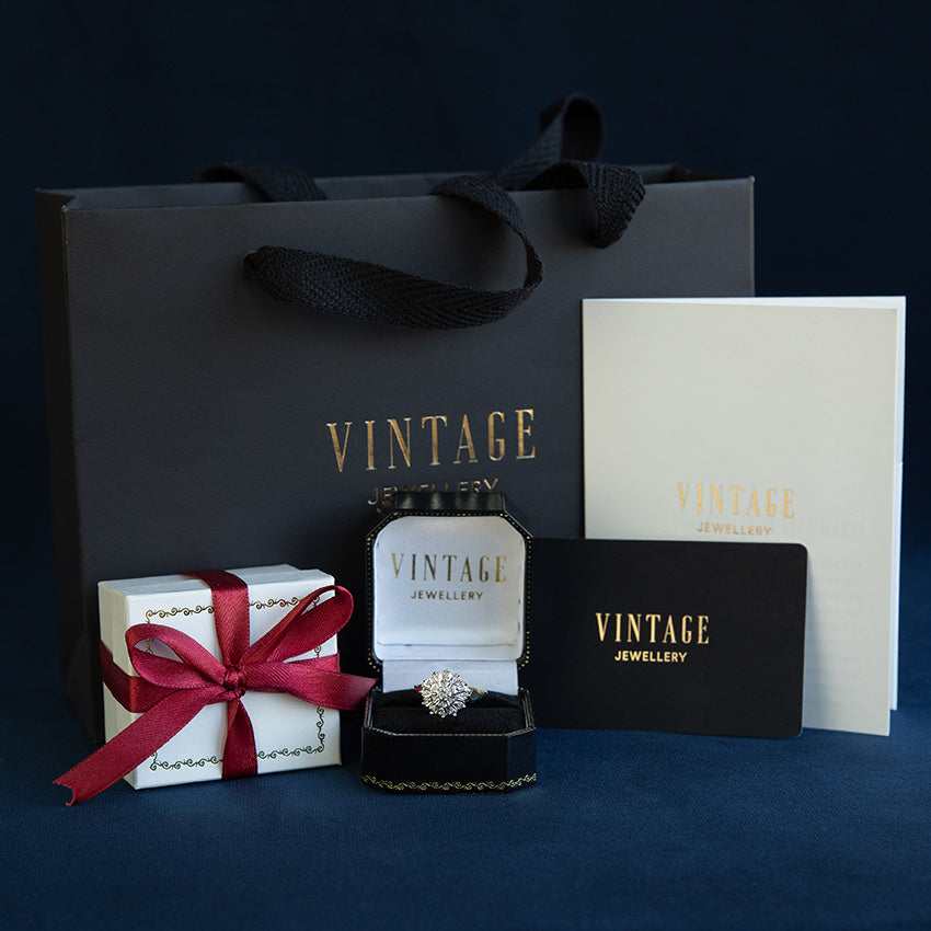 Vintage platinum entourage ring with diamond and blood coral 900