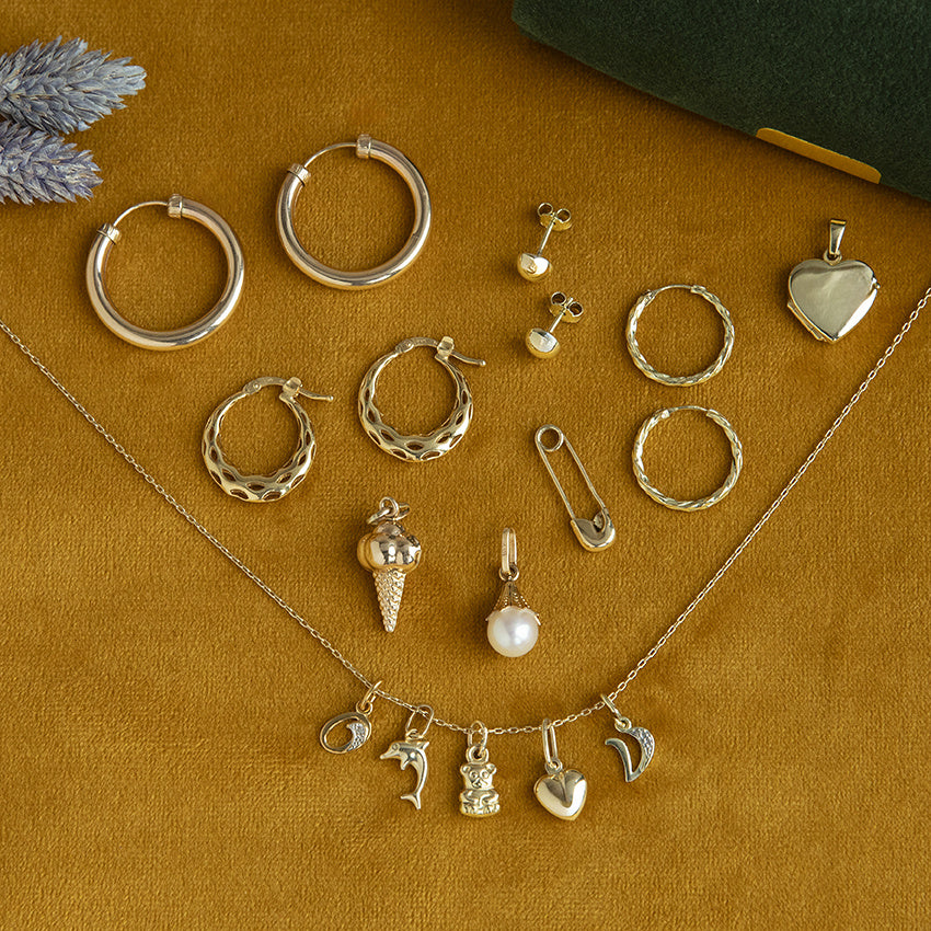 Gouden getordeerde oorringen 14 krt