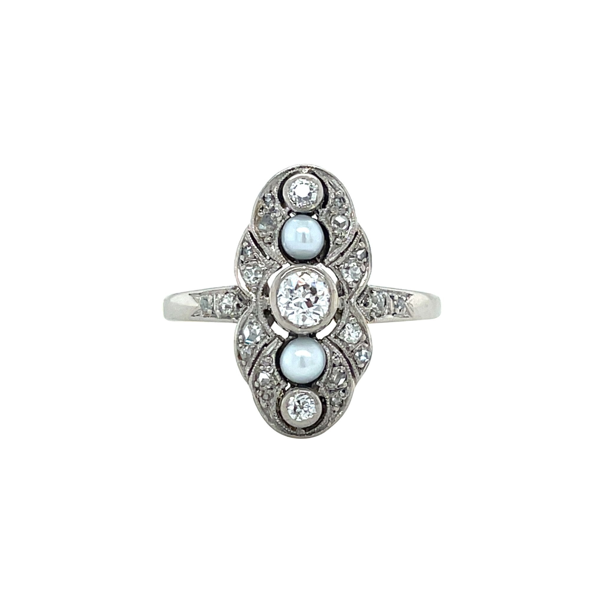 Gouden vintage ring met parel en diamant 14 kt