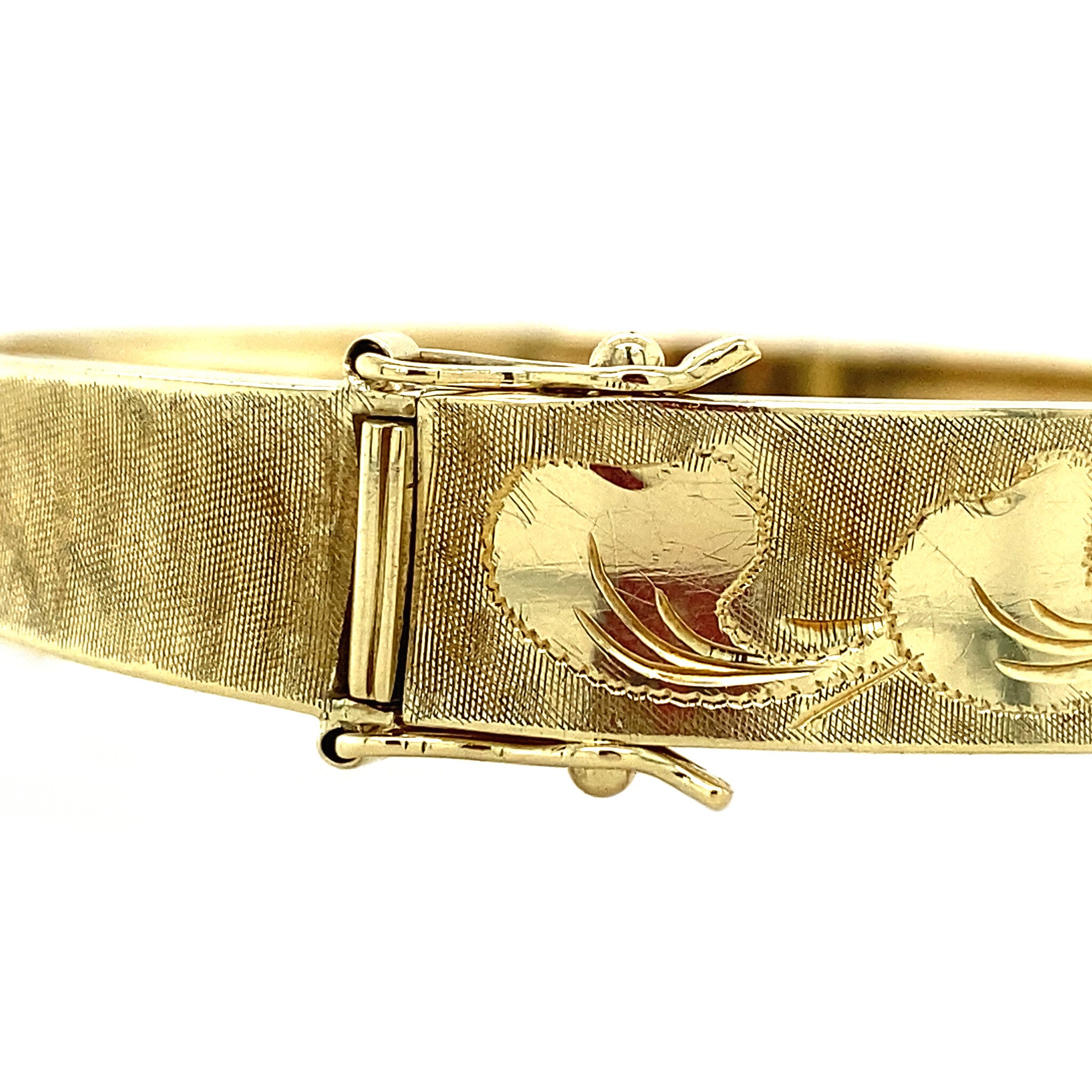 Vintage gold bangle with engraving, 14 kt