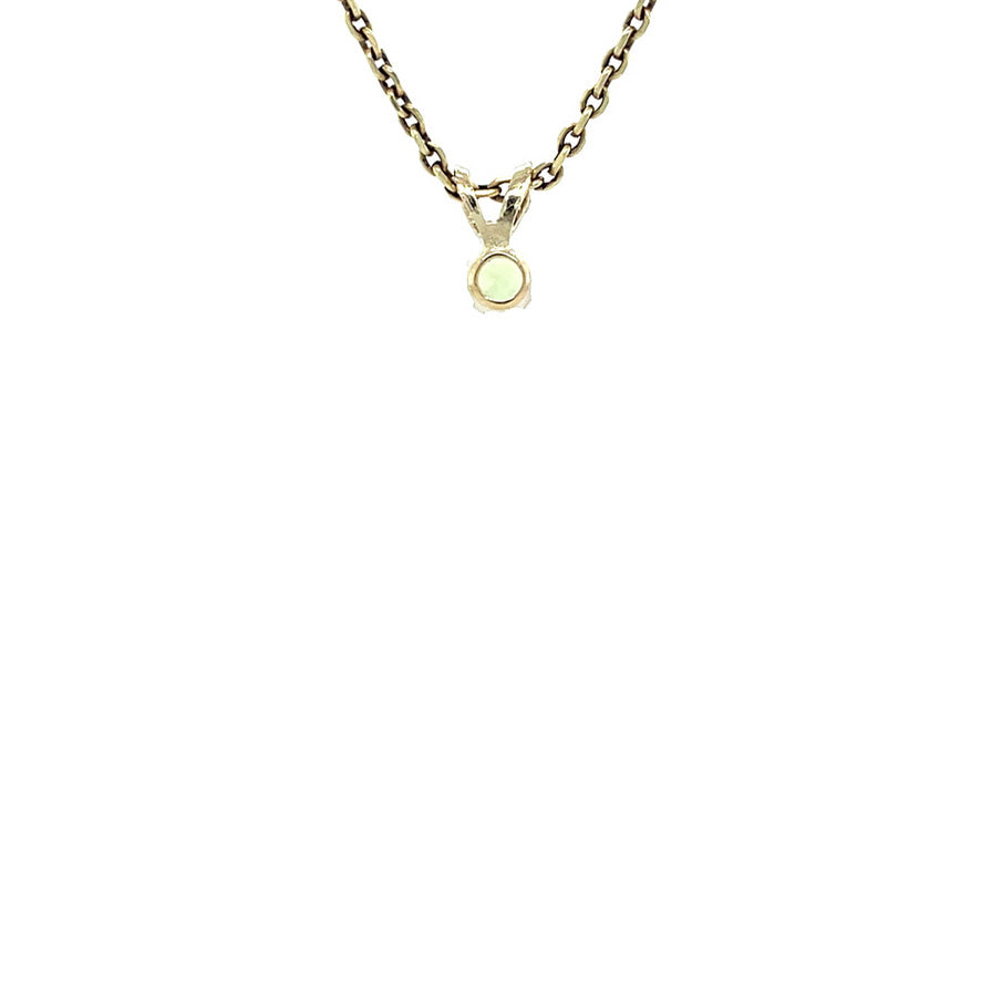 Golden vintage solitaire pendant with peridot 14 kt