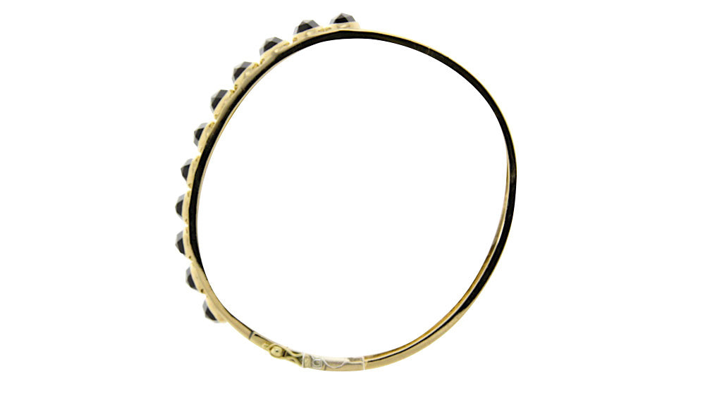 Gouden bangle met granaat 14 krt