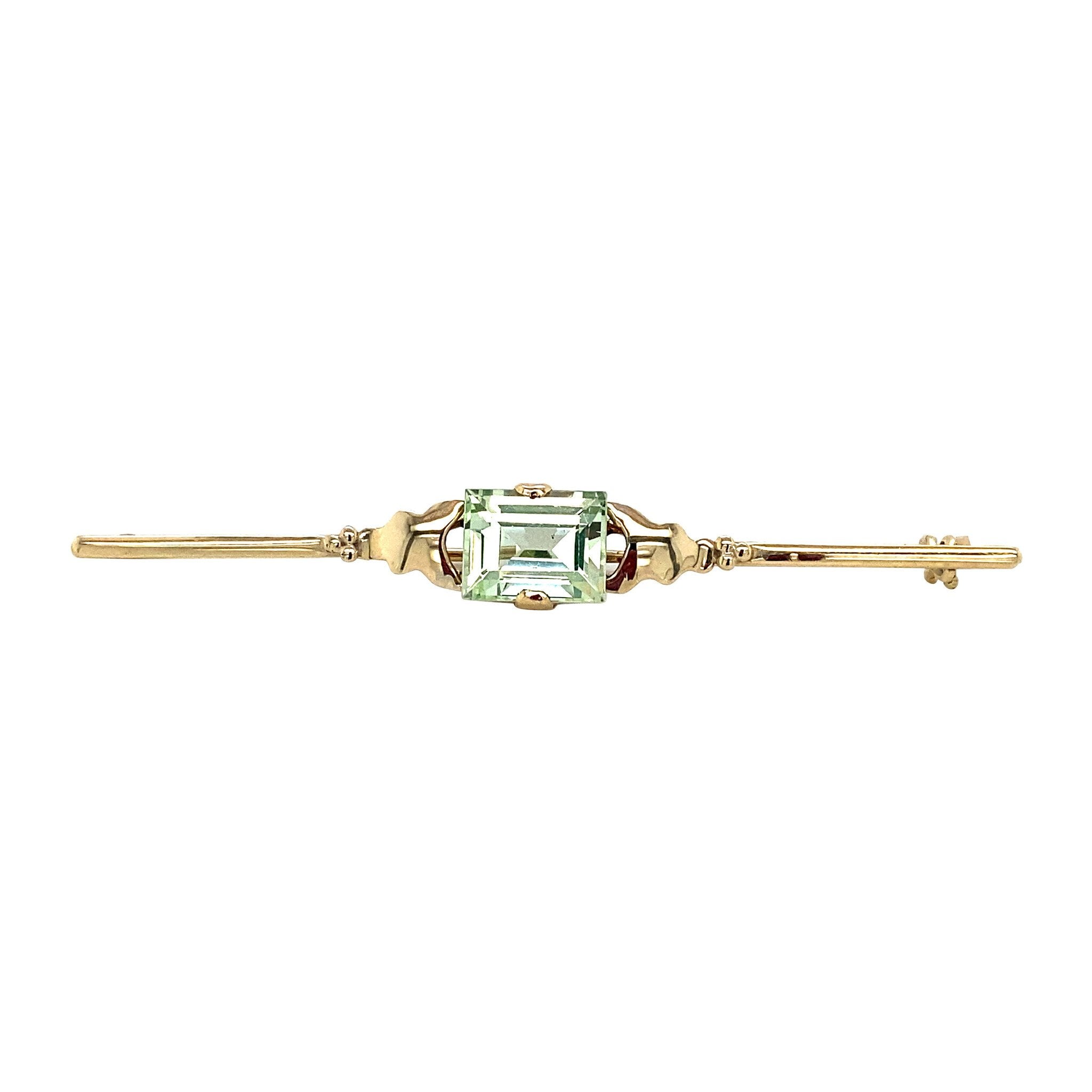 Gouden broche met groene spinel 14 krt
