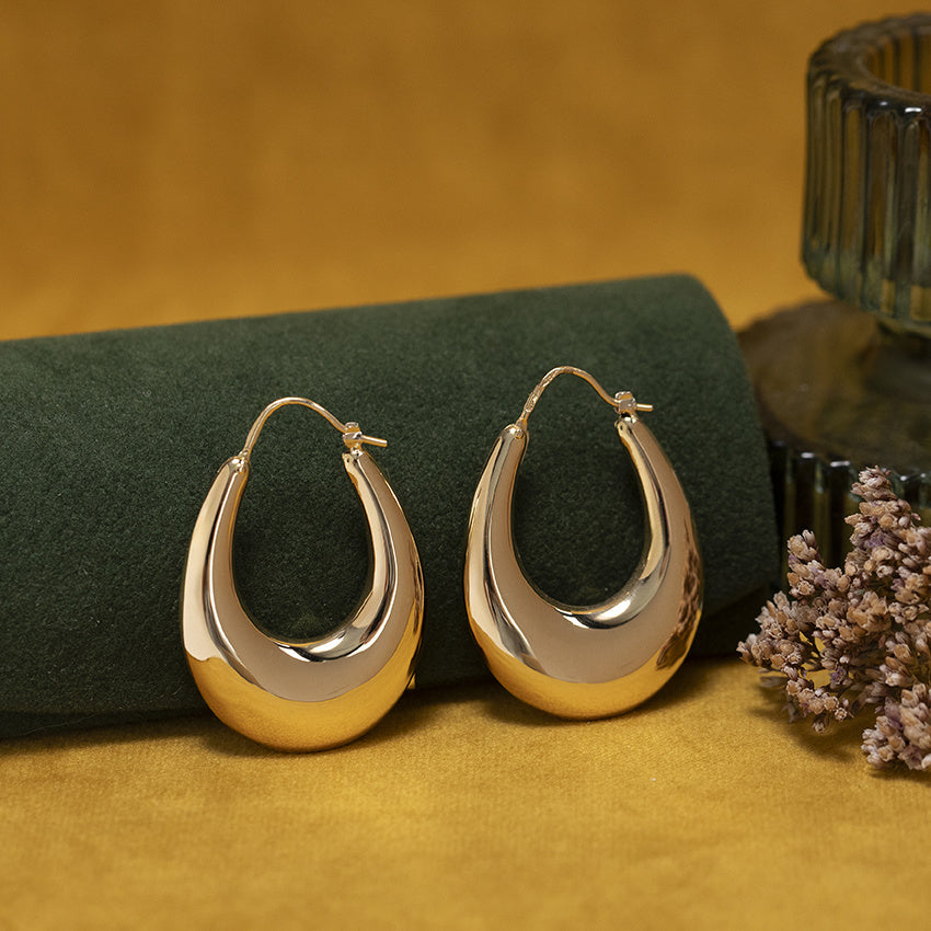 Gouden vintage gladde oorbellen 18 kt