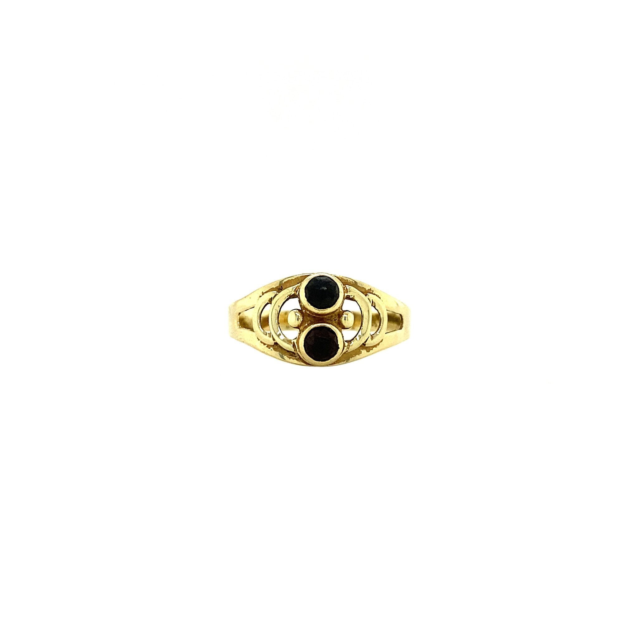 14 kt gold ring with garnet