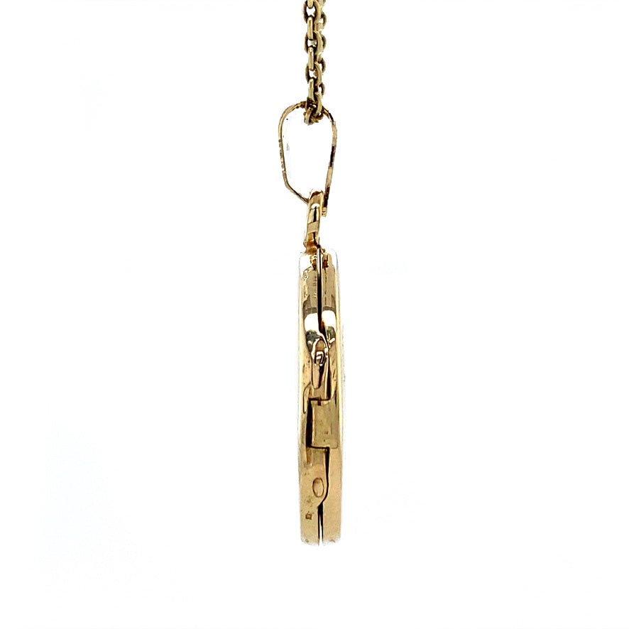 Gold locket with engraving 14 krt