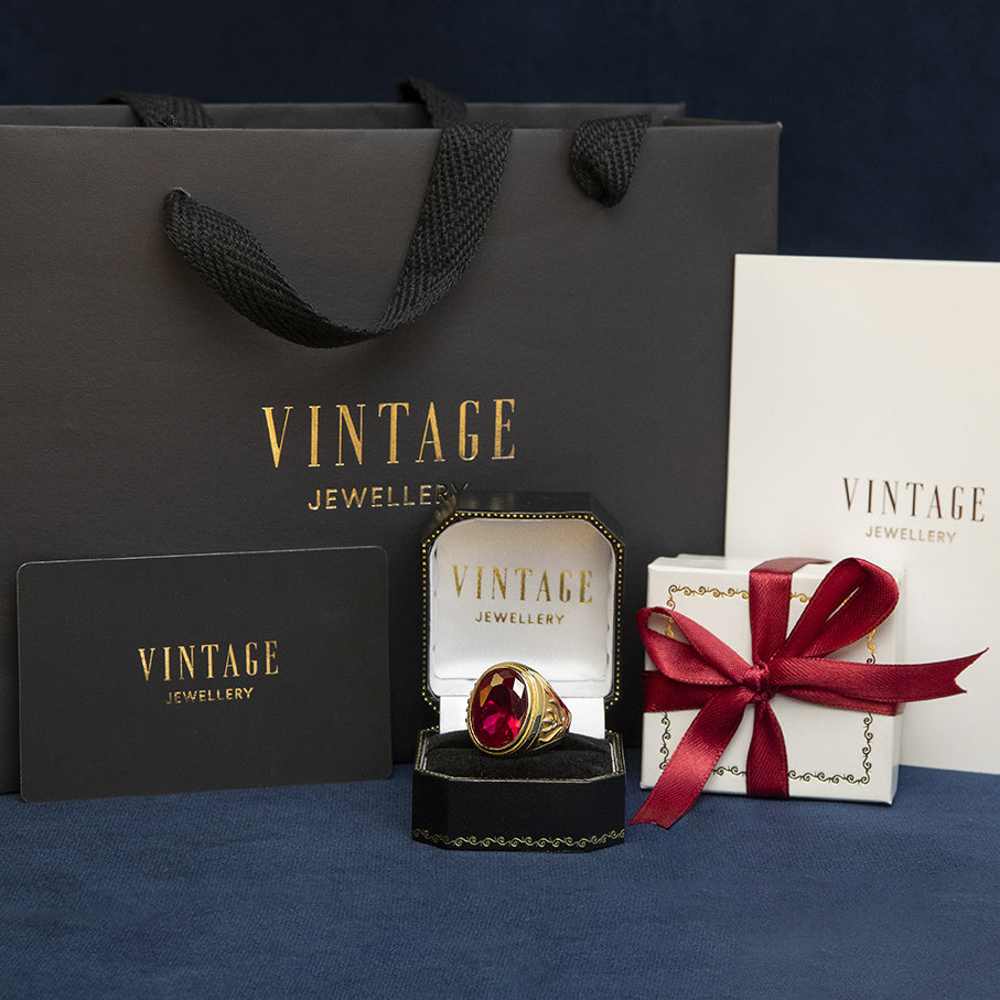 Gouden vintage zegelring met robijn 14 kt