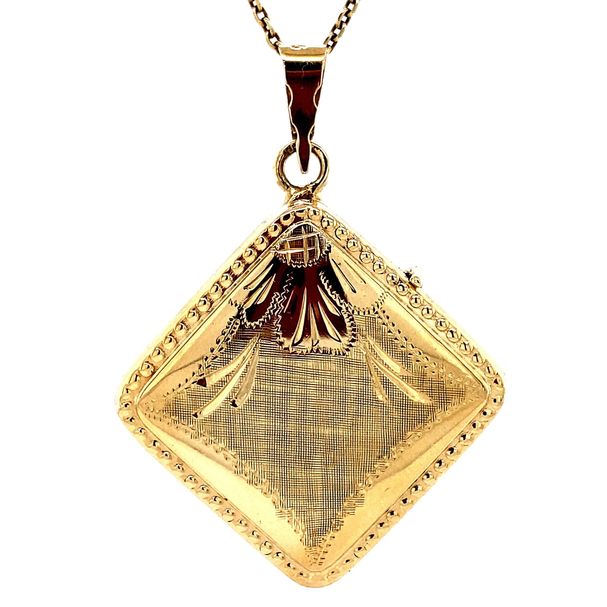 14 kt gold medallion with engraving