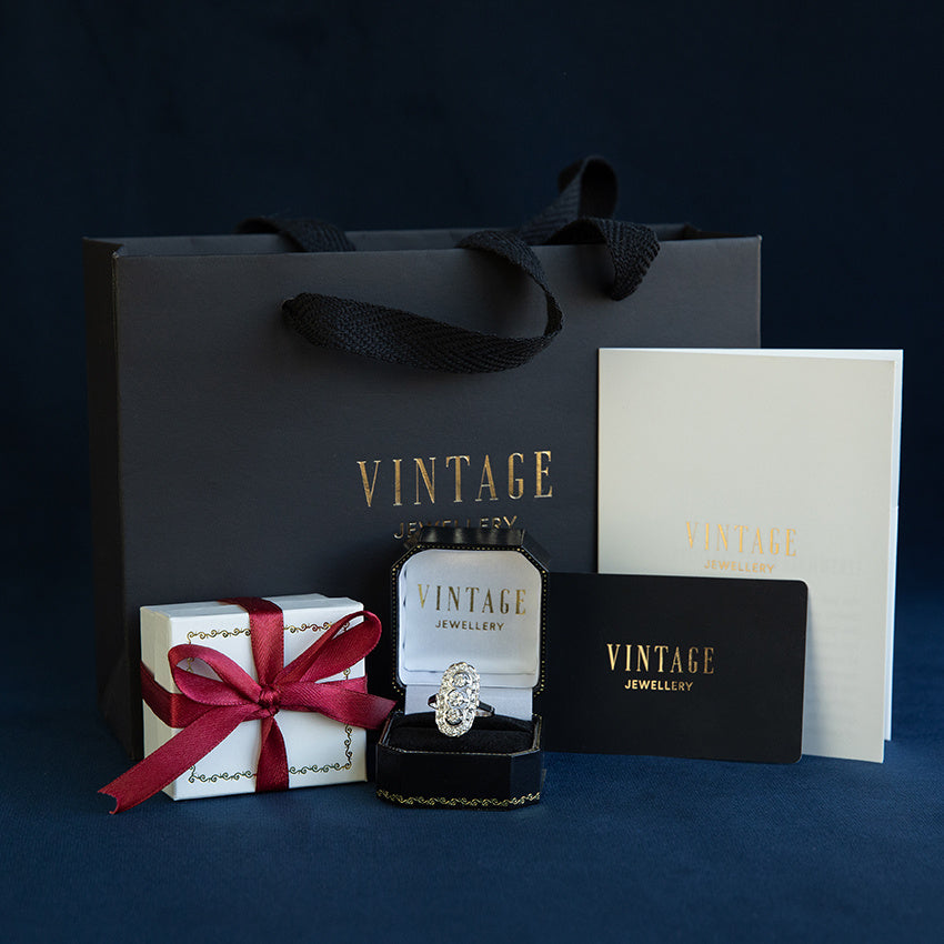 Witgouden vintage ring met saffier en diamant 14 krt