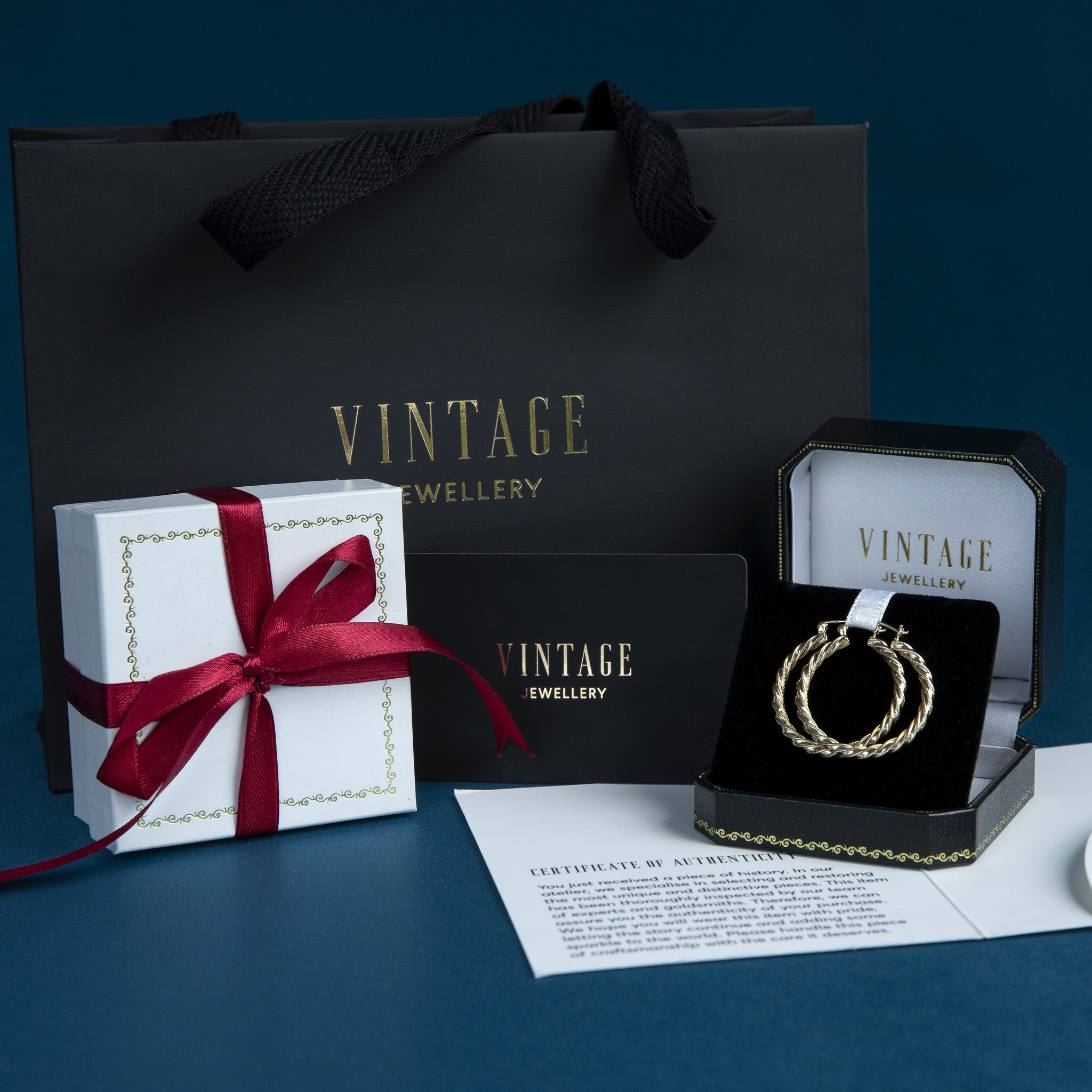 Gouden vintage fantasie oorringen 14 krt