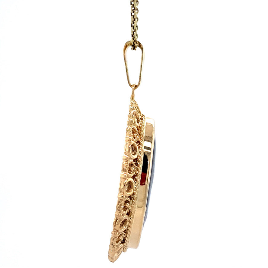 Gold vintage pendant with enamel 14 kt