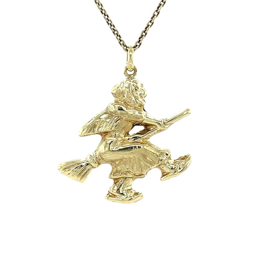 Vintage 14 kt gold witch pendant