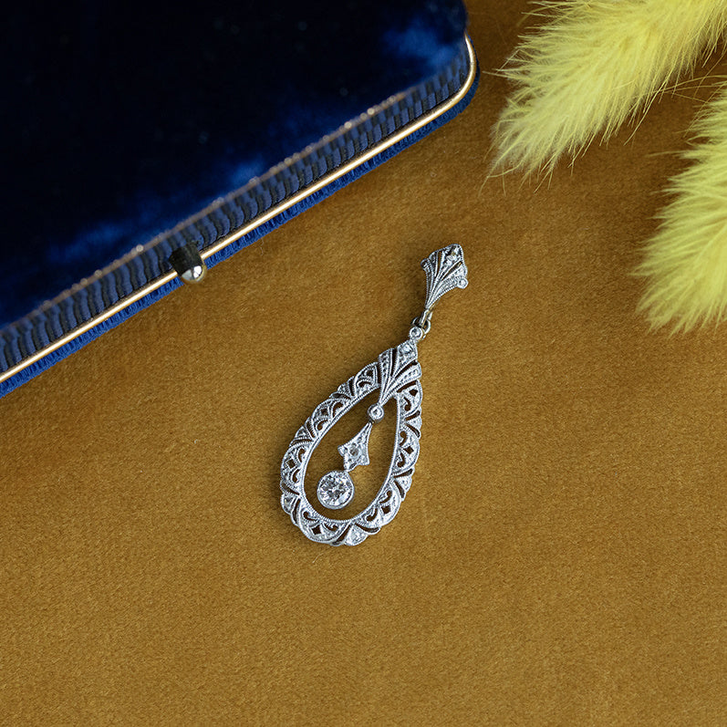 Witgouden vintage hanger met diamant 14 krt