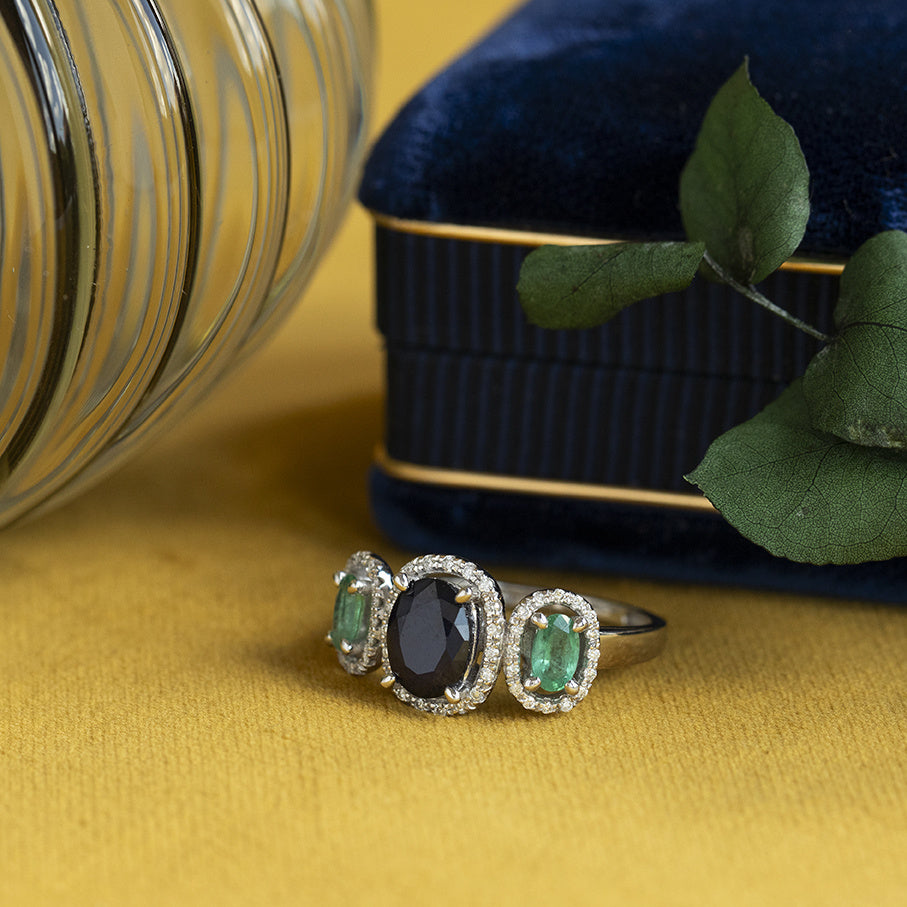 14 kt white gold vintage cluster ring with emerald, sapphire, and diamond