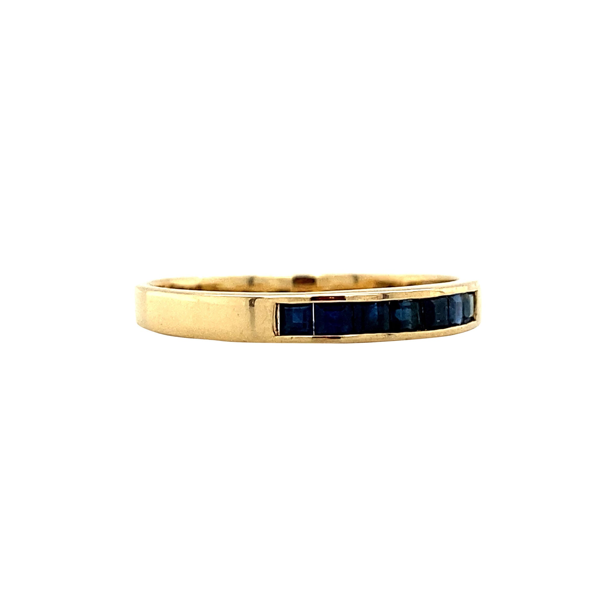 18 kt gold row ring with sapphire