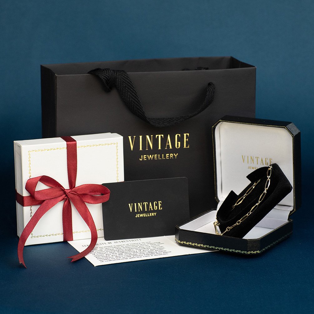 Gouden vintage bangle met granaat 14 krt