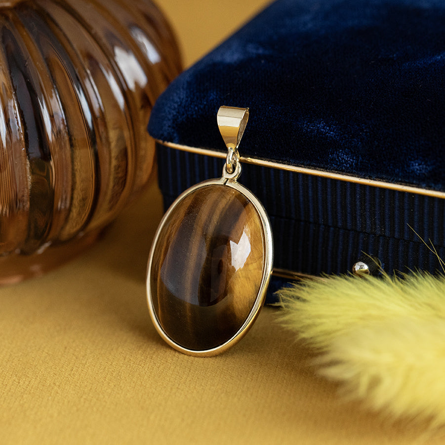 Gouden vintage hanger tijgeroog 14 krt